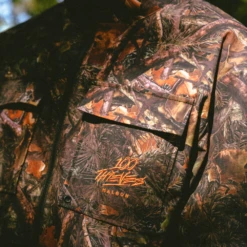 Malbon X 100 Thieves Woodsman Zip Off Windbreaker -Trend Wear Shop Untitleddesign 113